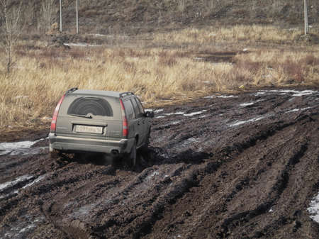 Kazakhstan, Ust-Kamenogorsk, March 14, 2019: Volvo V70 XC. Volvo car on a dirty road. Off roadのeditorial素材