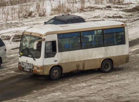 Kazakhstan, Ust-Kamenogorsk, February 16, 2019: Chinese bus FAW on one of the streets of the city. City Bus. Public transportのeditorial素材