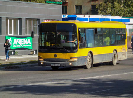 Kazakhstan, Ust-Kamenogorsk, October 4, 2019: Chinese bus Zhong Tong. Yellow city busのeditorial素材