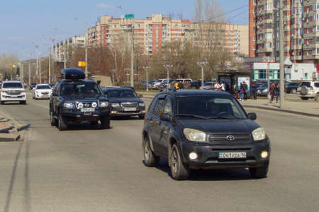 Kazakhstan, Ust-Kamenogorsk, april 23, 2019: Traffic. One of the city streets. Downtown. Street trafficのeditorial素材
