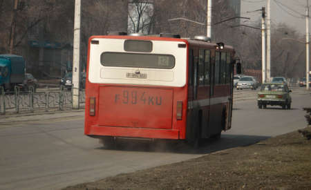 Kazakhstan, Ust-Kamenogorsk, March 29, 2019: City bus. Public transport. City traffic. Carsのeditorial素材