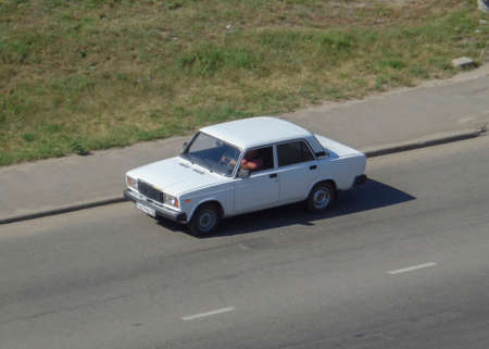 Kazakhstan, Ust-Kamenogorsk, August 11, 2019: Motor car Lada 2107 in the city street. Top viewのeditorial素材