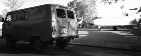 Kazakhstan, Ust-Kamenogorsk, September 10, 2019: Yak 40 airplane and Uaz 452. Open-air museum. Black and whiteのeditorial素材