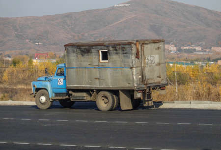 Kazakhstan, Ust-Kamenogorsk, September 10, 2019: Truck GAZ 53 on the road. Old soviet truckのeditorial素材