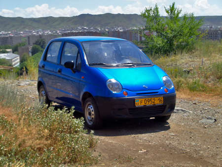 Kazakhstan, Ust-Kamenogorsk, july 8, 2019: Daewoo Matiz (aka Chevrolet Spark) first generation. Blue car. Landscapeのeditorial素材
