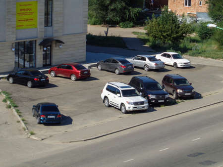 Kazakhstan, Ust-Kamenogorsk, August 11, 2019: Cars parked in the parking lot. Top view of parked vehiclesのeditorial素材