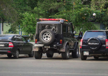 Kazakhstan, Ust-Kamenogorsk, August 16, 2019: Cars parked in the parking lot. Lada, Uaz and Suzukiのeditorial素材