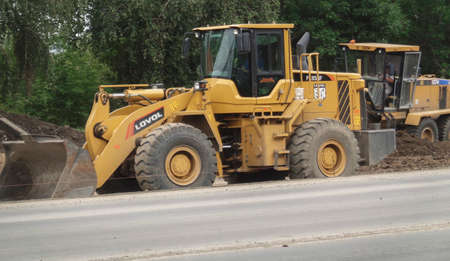Kazakhstan, Ust-Kamenogorsk, august 21, 2019: Construction engineering. Road constructionのeditorial素材