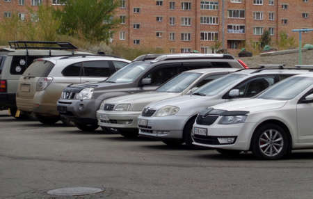 Kazakhstan, Ust-Kamenogorsk, september 8, 2019: Cars parked on the streetのeditorial素材
