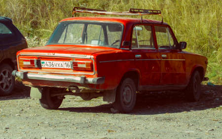 Kazakhstan, Ust-Kamenogorsk, October 4, 2019: Vaz 2106. Lada 1600. Zhiguli classic soviet car. Red ladaのeditorial素材