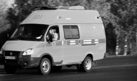 Kazakhstan, Ust-Kamenogorsk, September 10, 2019: Ambulance rides on call. Black and White. Ambulance carのeditorial素材