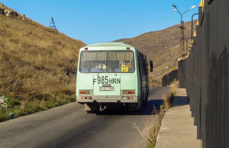 Kazakhstan, Ust-Kamenogorsk, october 4, 2019: Urban bus PAZ 4234 in the city street. Public transport. Passenger transportation. Commercial vehicles. Mountainsのeditorial素材