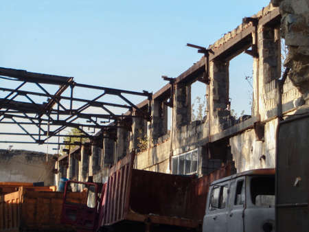 Abandoned trucks in an old ruined building. Ust-Kamenogorsk (Kazakhstan). Commercial vehiclesのeditorial素材