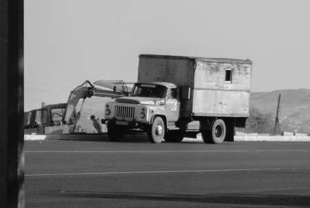 Kazakhstan, Ust-Kamenogorsk, September 10, 2019: Truck GAZ 53 on the road. Old soviet truck. Black and whiteのeditorial素材