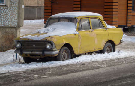 Kazakhstan, Ust-Kamenogorsk, December 13, 2019: Yellow Moskvitch 412. Old soviet car. Abandoned carのeditorial素材