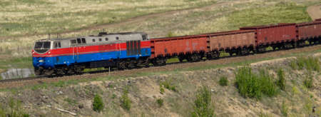 Freight train - Cargo transportation. Cargo railroad industry. Locomotiveの写真素材