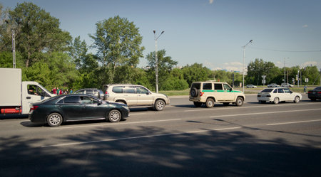 kazakhstan, Ust-Kamenogorsk, may 18, 2022: Traffic. One of the city streetsのeditorial素材
