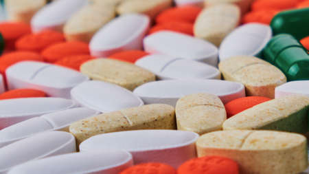 multicolored pills and tablets close upの写真素材