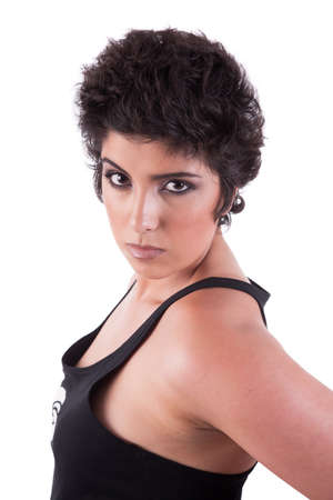 beautiful and serious woman, looking to camera, on white background, studio shotの写真素材
