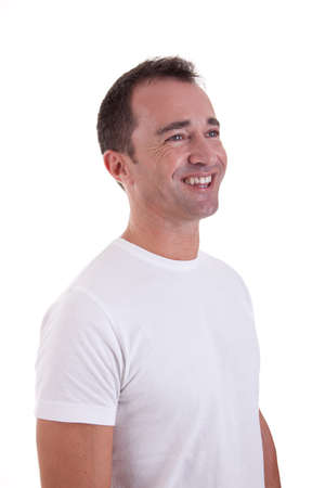 Portrait of a handsome middle-age man smiling, on white background. Studio shotの写真素材
