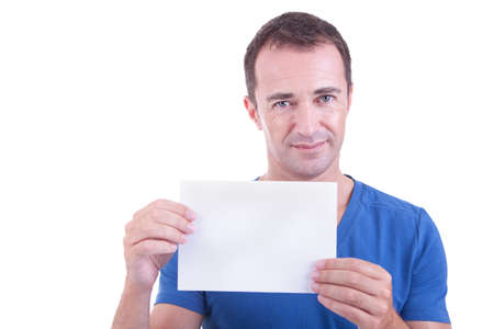Portrait of a handsome man, with blank  card in hand, smiling, isolated on white background. Studio shot.の写真素材