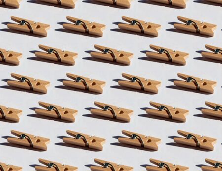 Seamless pattern with decorative wood clothespin with hard lightの写真素材
