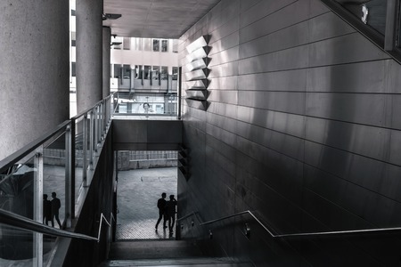 Abstractly hallway of modern building. The building where the photo forum took place in Barcelona 2017, the play of light and shadows in a geometric architectural spaceのeditorial素材