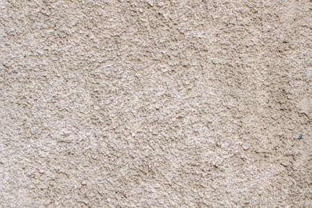 Gray concrete wall with relief, texura, backgroundの写真素材