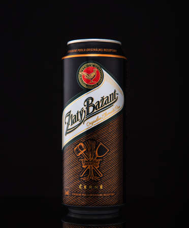 MINSK, BELARUS - JANUARY 04, 2017: Can of Zlaty Bazant beer over black background. Zlaty Bazant a Slovak beer brand produced in Hurbanovo brewery owned by Heineken Int group.のeditorial素材