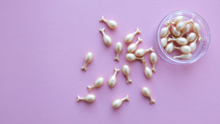 Sprouted garlic in a petri dish on a pink background.