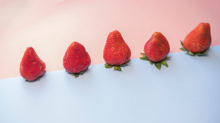 Strawberries on a white and blue background. selective focus.の写真素材