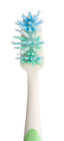 Old toothbrush on a white background. Isolate.の写真素材