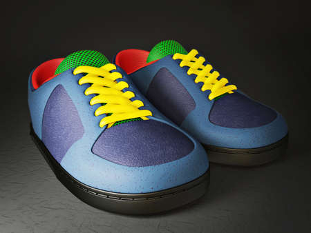 modern sneakers isolated on a black backgroundの写真素材