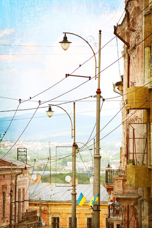 Very old street with Long lamp-post and blue sky の写真素材