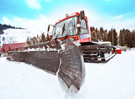 Big red snowcat in the mountain. Close-up.の写真素材