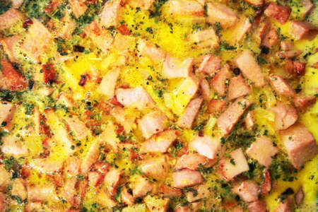 Delicious omelet with sausage on top form.の写真素材