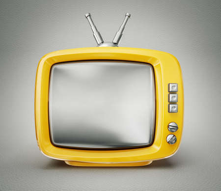 yellow tv isolated on a grey backgroundの写真素材