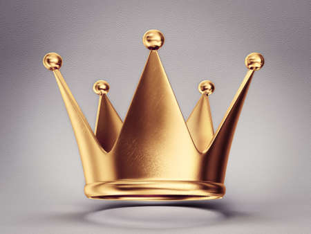 gold crown isolated on a grey backgroundの写真素材
