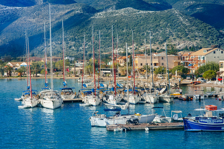 Island of Greece with very nice harbor and boats on a sunny dayのeditorial素材