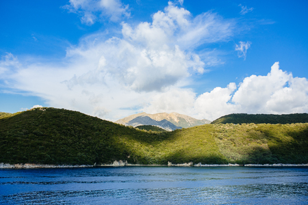 Islands in Greece on a sunny day with blue skyの写真素材