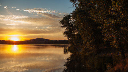 Landscape at sunset on the lakeの写真素材