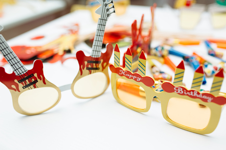 photo booth props for wedding. funny paper faces, lips, glasses and mustacheの写真素材