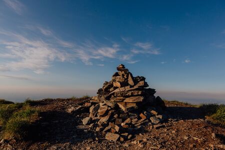 stone mounds at sunset, the Carpathian mountains Fagaras, Romania, outdoorsの写真素材