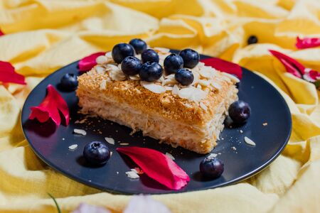 slice of vegetarian cake on yellow background, top view, vegetarian foodの写真素材