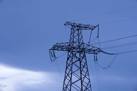 Power Transmission Line With Cloudy Sky On The Background.の写真素材