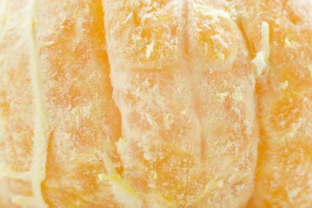 extreme close up tangerine peeled isolated on white background, This has clipping path. Open mandarin on white background. micro shoot.の写真素材