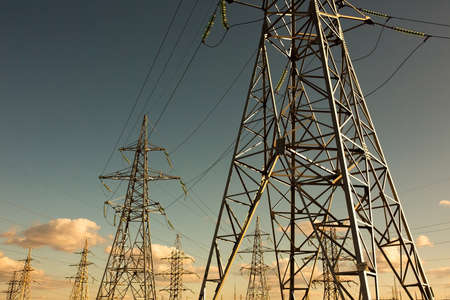 power line support with wires for electricity transmission. High voltage grid tower with wire cable at distribution station. energy industry, energy savingの写真素材
