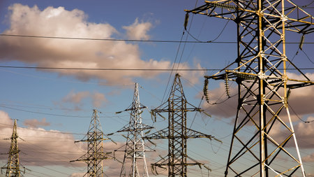 high voltage post. electricity pylons on sky background. electricity steel pylon tower. Green energy...