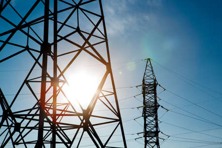industrial landscape. Silhouette High voltage electric tower on sunset time and sky on sunset time background.の写真素材