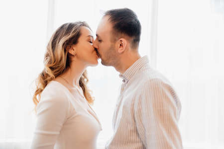Loving everything about her. Beautiful young couple bonding and smiling. cheerful excited glad careless happy with toothy beaming smile brunette attractive woman and with stylish man,の写真素材